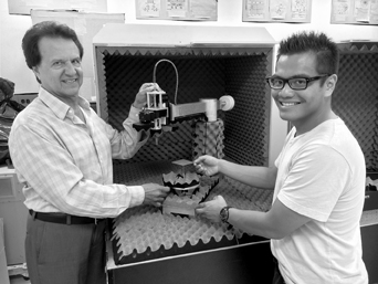 photo: professor Yahya Rahmat-Samii and doctoral student Jean Paul Santos operate the world s first millimeterwave tabletop bipolar planar near-field antenna measurements and diagnostic system