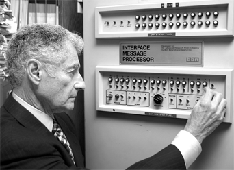 Distinguished Professor of Computer Science Leonard Kleinrock with the Interface Message Processor, the backbone of the Arpanet.