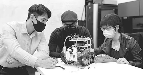 students with agriculture robot