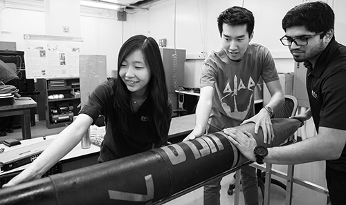 Rocket Project club members with rocket